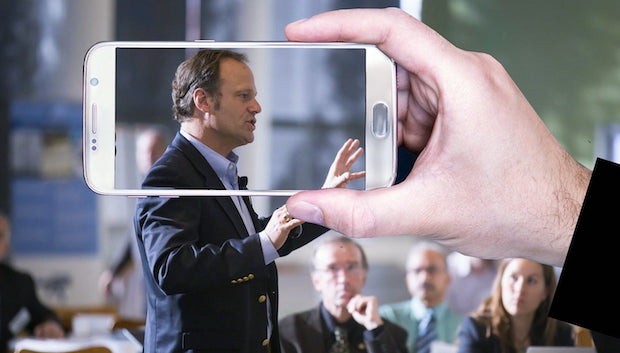 Mobile phone frame with male in suit 